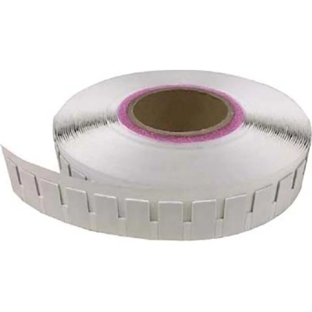 Roll of small white anti-metal UHF RFID stickers, 30 × 15 mm, on a paper core